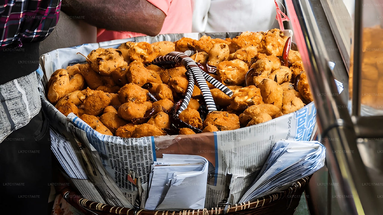 Basket of fried snacks on a newspaper with a blurred background