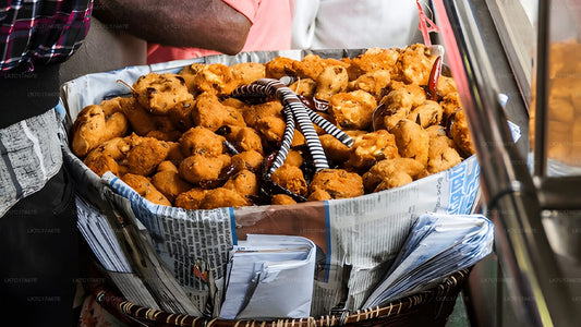 Basket of fried snacks on a newspaper with a blurred background